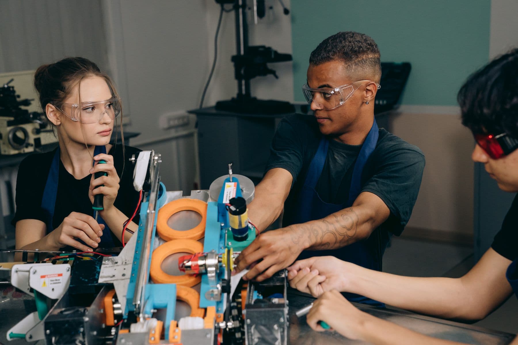 Engineers inspecting industrial machinery